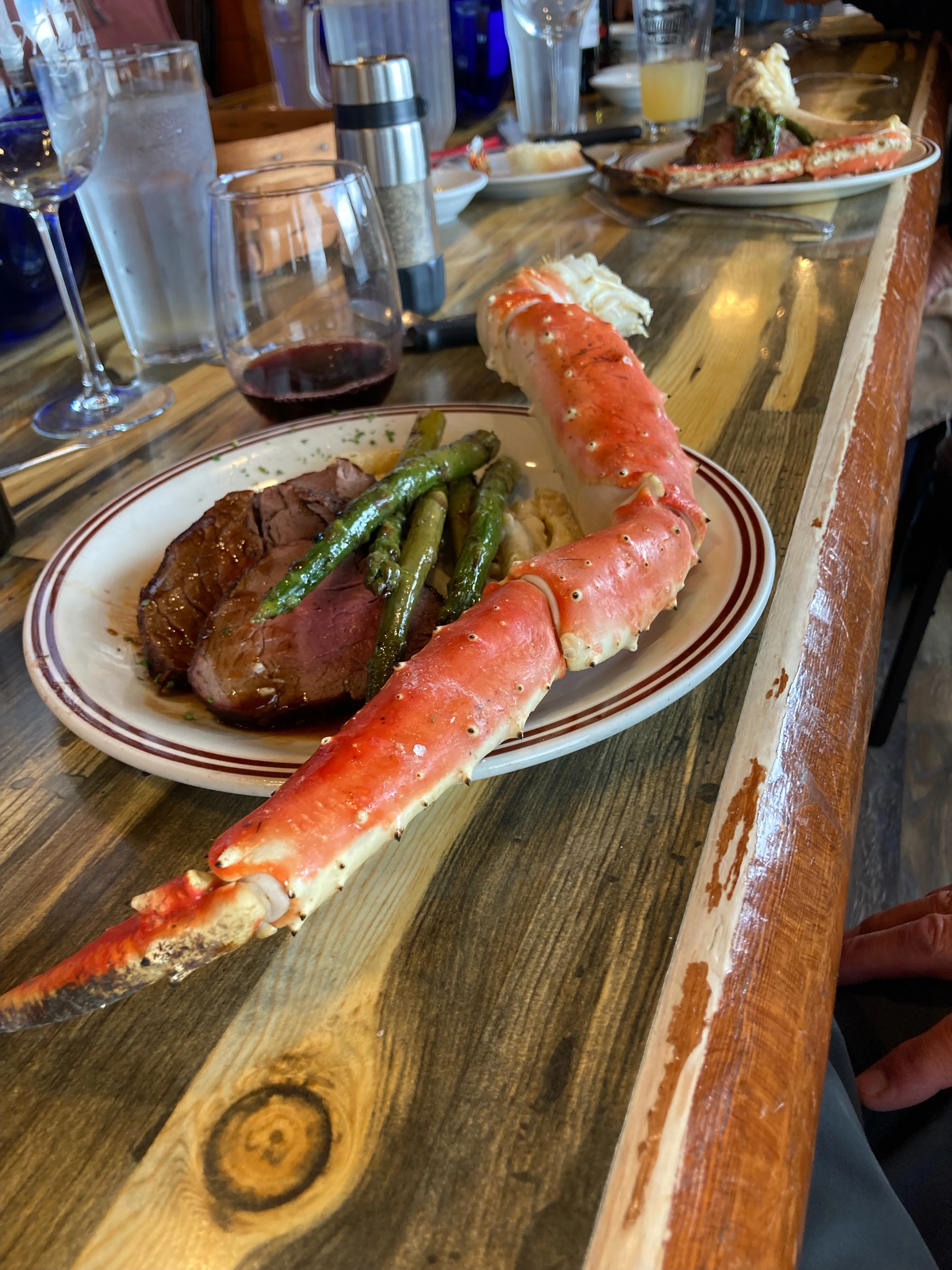 King crab legs and grilled steak at Newhalen Lodge