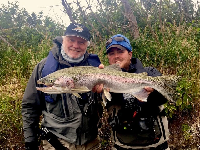 Angler casting on a remote Bristol Bay river