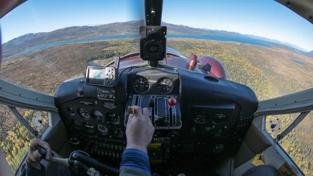 View from inside a floatplane over Alaskan wilderness