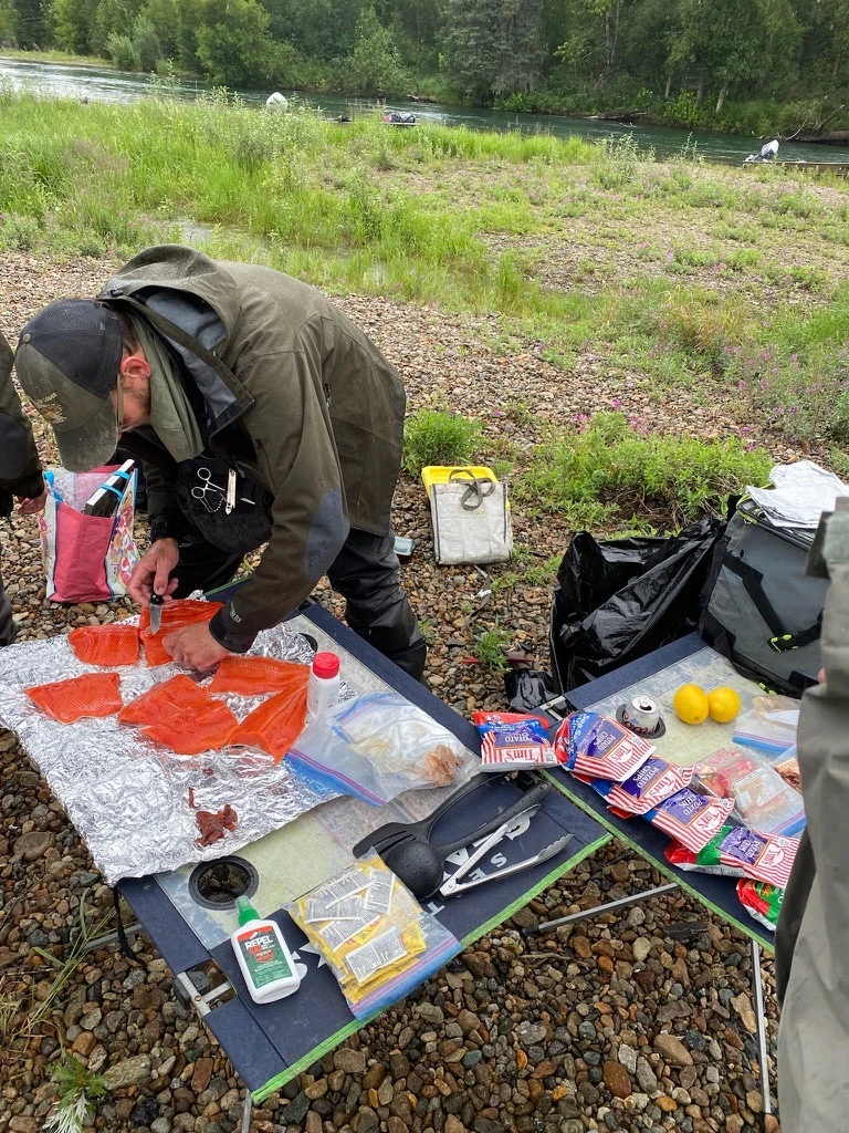 Newhalen guide prepping shore lunch